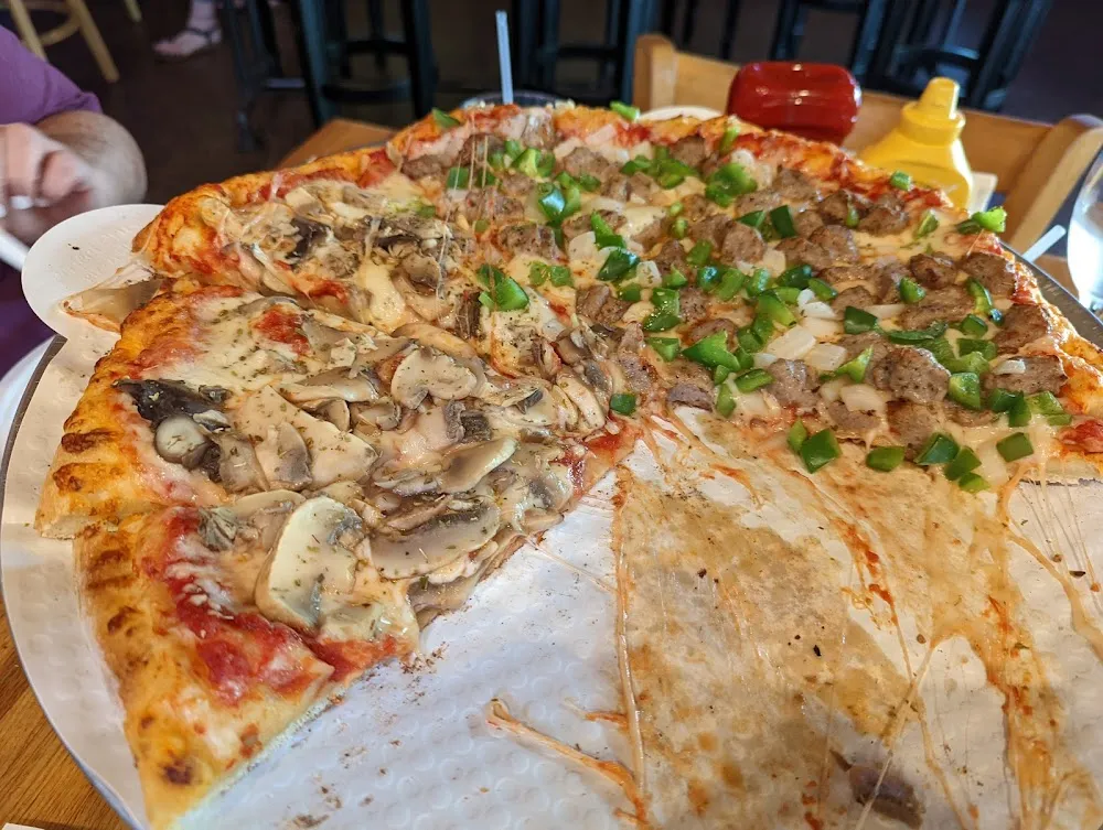 Mushroom and Sausage Onion and Pepper Pizza